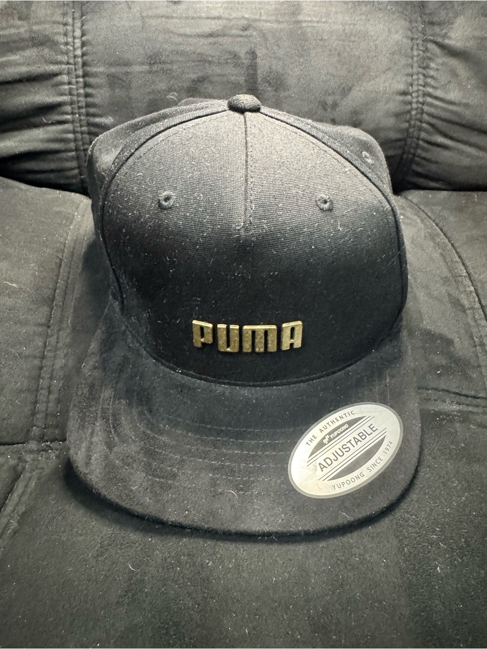 Puma Black Hat with Gold Accent Logo